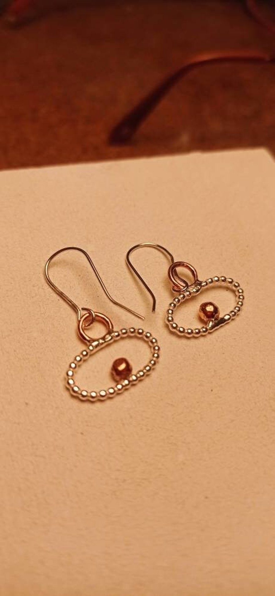 Contemporary silver and Copper earrings. Designer, Copper and silver jewellery.