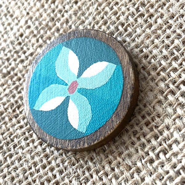 Wooden Floral brooch with blues and orange 