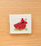 Textile brooch. - Image 1