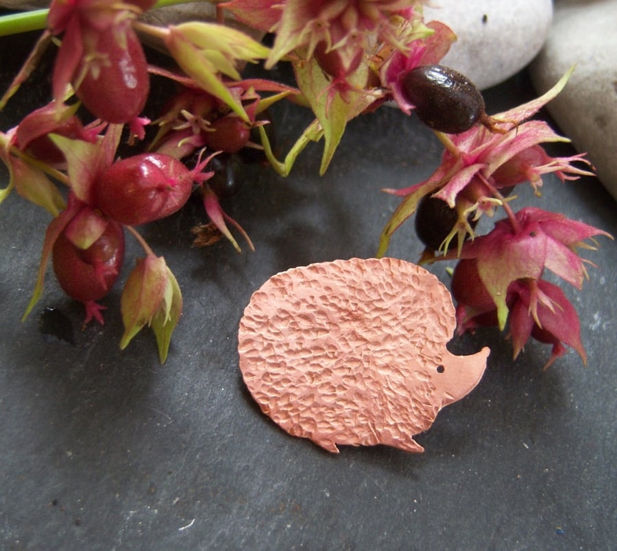 Hedgehog brooch in copper