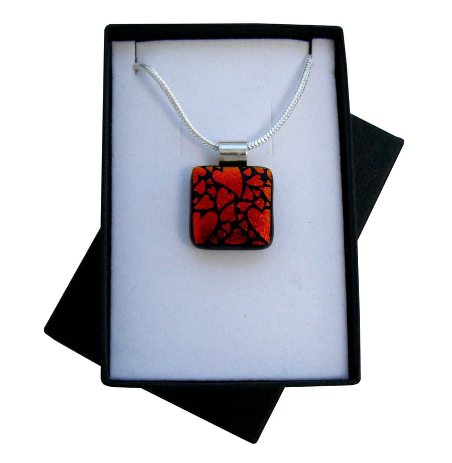 HANDMADE FUSED DICHROIC GLASS 'RED HEARTS' PENDANT.