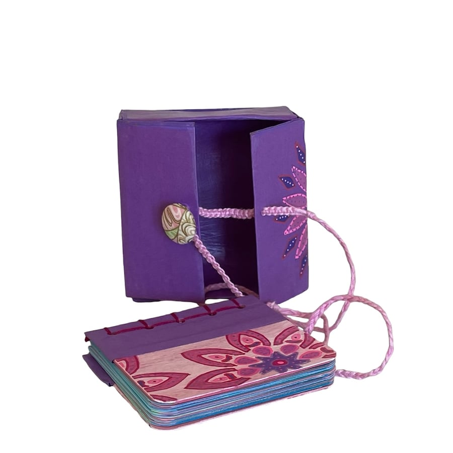 Small hand made note book in a box