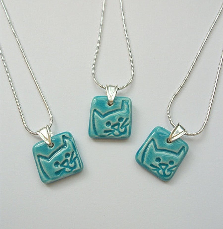 Turquoise ceramic cat pendant necklace on sterling silver