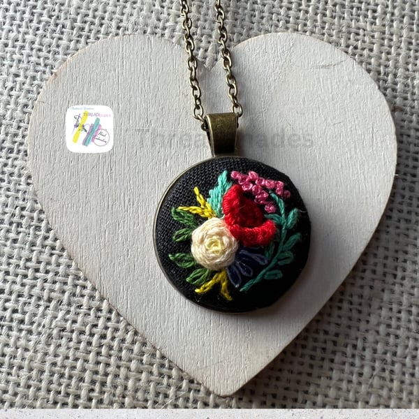 Hand embroidered pendant, round antique bronze, floral design, handmade necklace