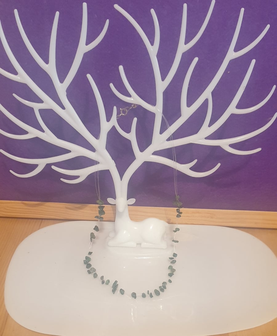 Floating emerald gemstone necklace.