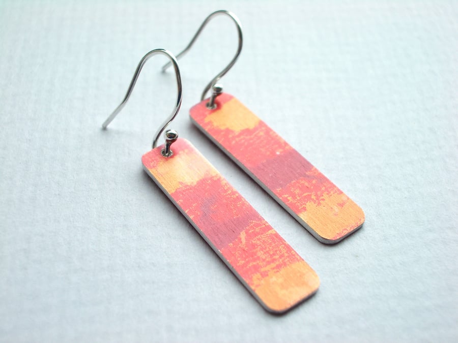 Orange rectangle earrings with lava pattern