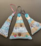 stitched textile hanging decorations - Image 1
