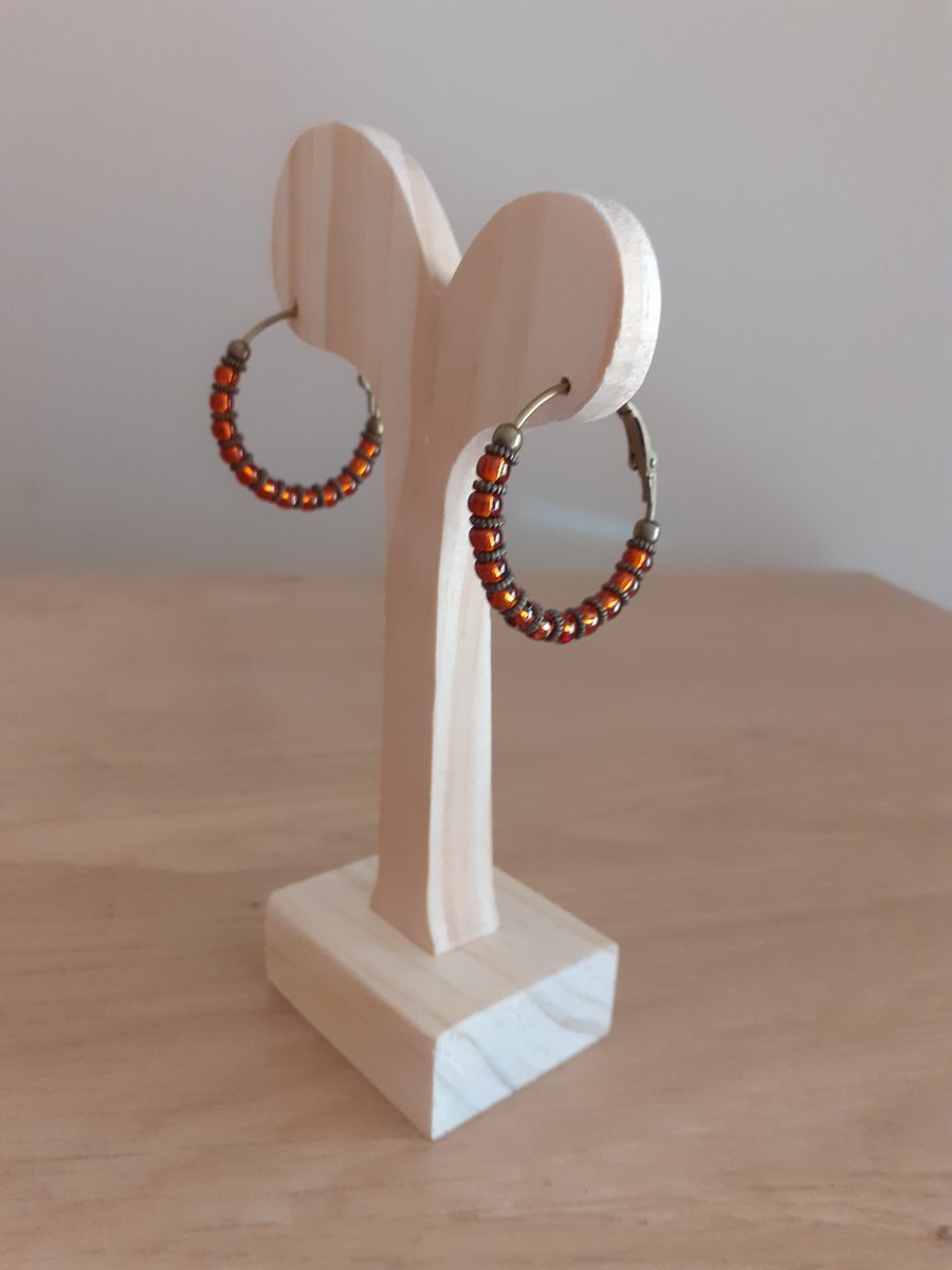 ANTIQUE BRONZE AND DARK TOPAZ HOOP EARRINGS.