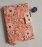 A5 Reusable Fabric Notebook Cover - Dandelion Clocks on Orange with Teal Lining - Image 1