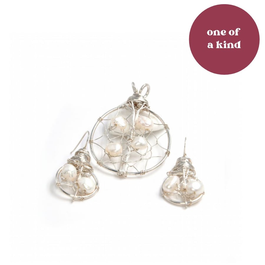 Fresh water  pearl earrings and pendant; silver plated jewellery set