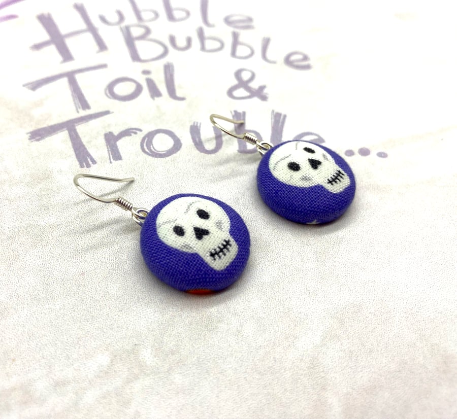 Skulls on purple fabric button dangle earrings -  Seconds Sunday