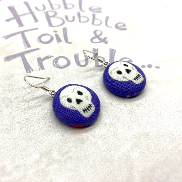 Skulls on purple fabric button dangle earrings -  Seconds Sunday