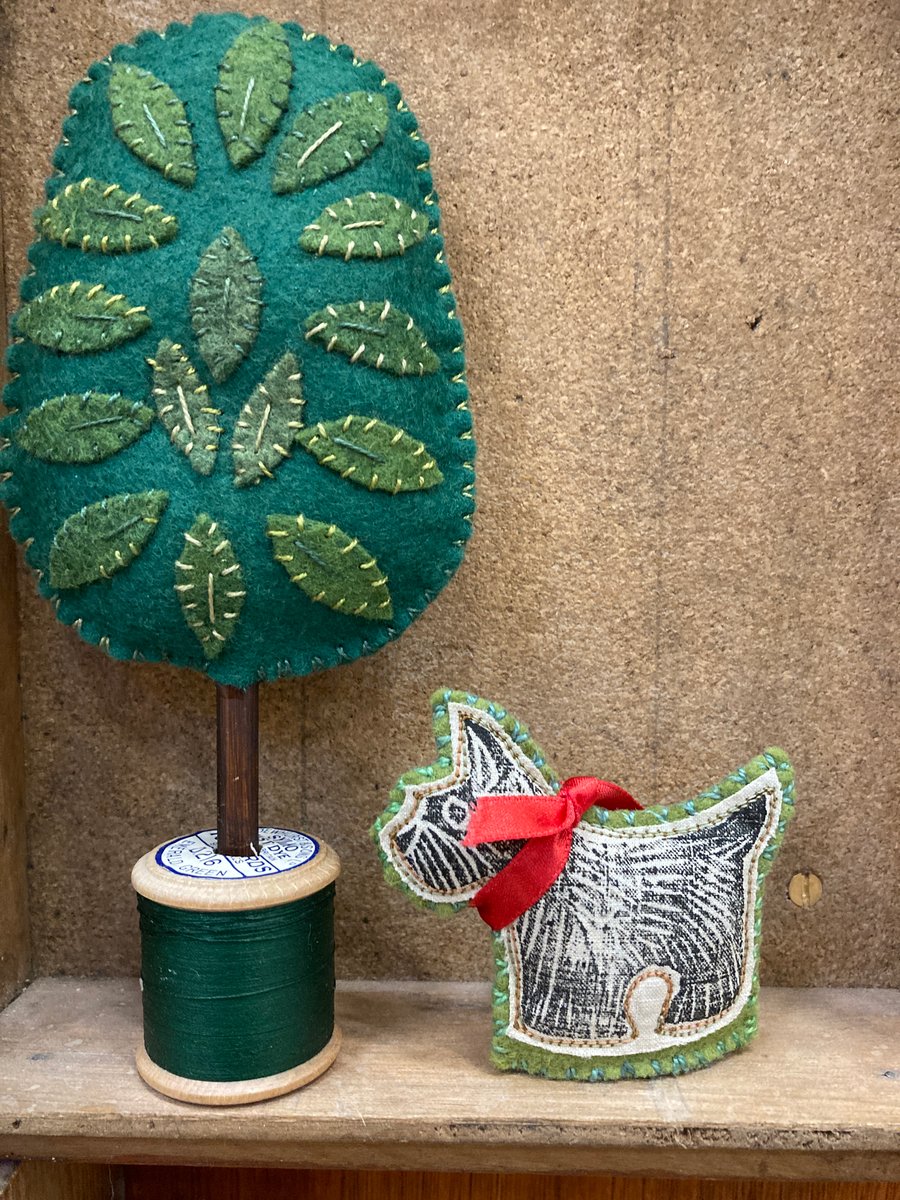 Racing green tree with olive green leaves