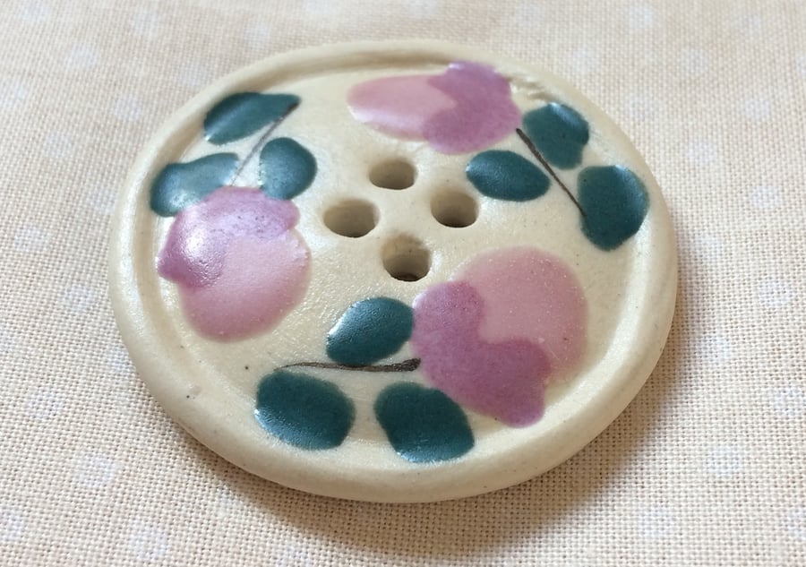 Large cream ceramic button with pink flowers