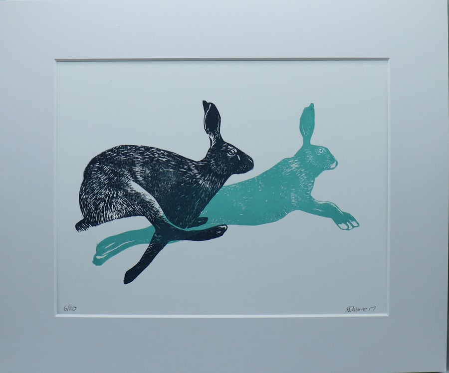 Running Hares Linocut Print, Mounted Blue Artwork