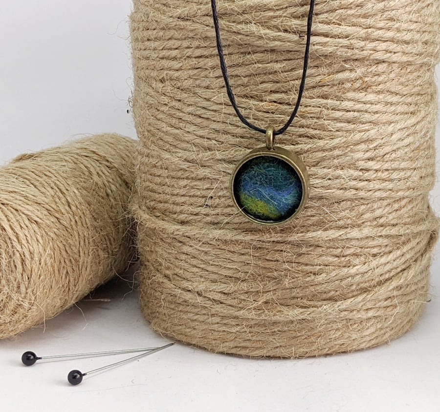 Felted pendant - blues and greens in bronze bezel