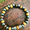Hematite, Wood beaded Bracelet with Tibetan Spacers