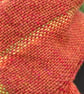 Handwoven Scarf in Reds, Orange and Green - Image 5