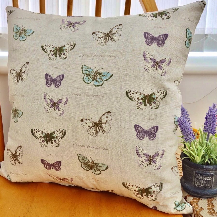 Cushion: Butterfly design, Double Sided with pad and zip fastening 