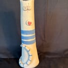 Tall cat vase