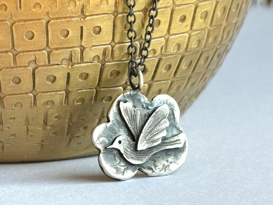 Silver flying bird & cloud necklace