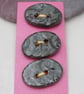3 Medium Oval Obsidian Brocade Pattern Ceramic Buttons - Image 1