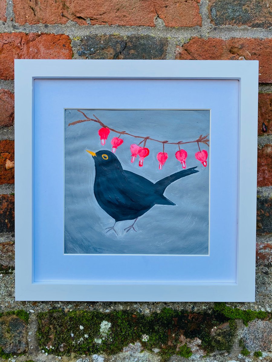 Blackbird with bleeding hearts