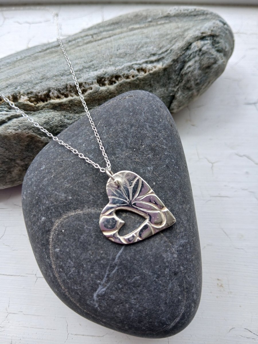 Silver side hanging heart