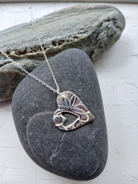 Silver side hanging heart