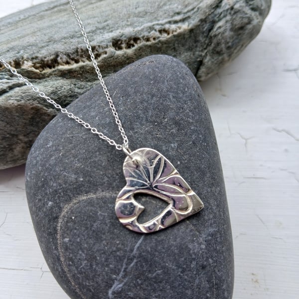 Silver side hanging heart