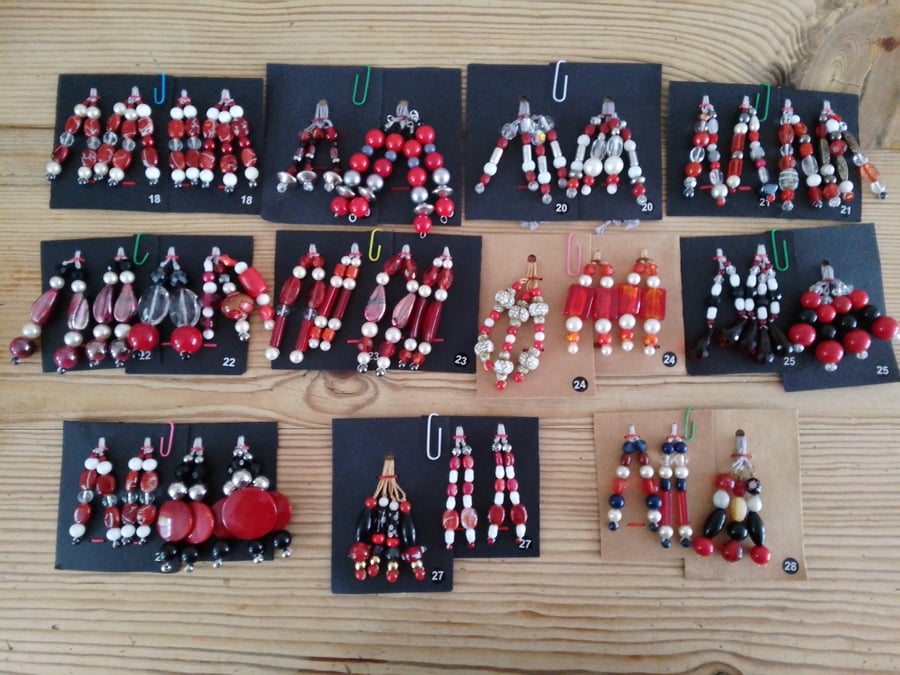 set of colour coordinated beaded gift decorations