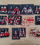 set of colour coordinated beaded gift decorations
