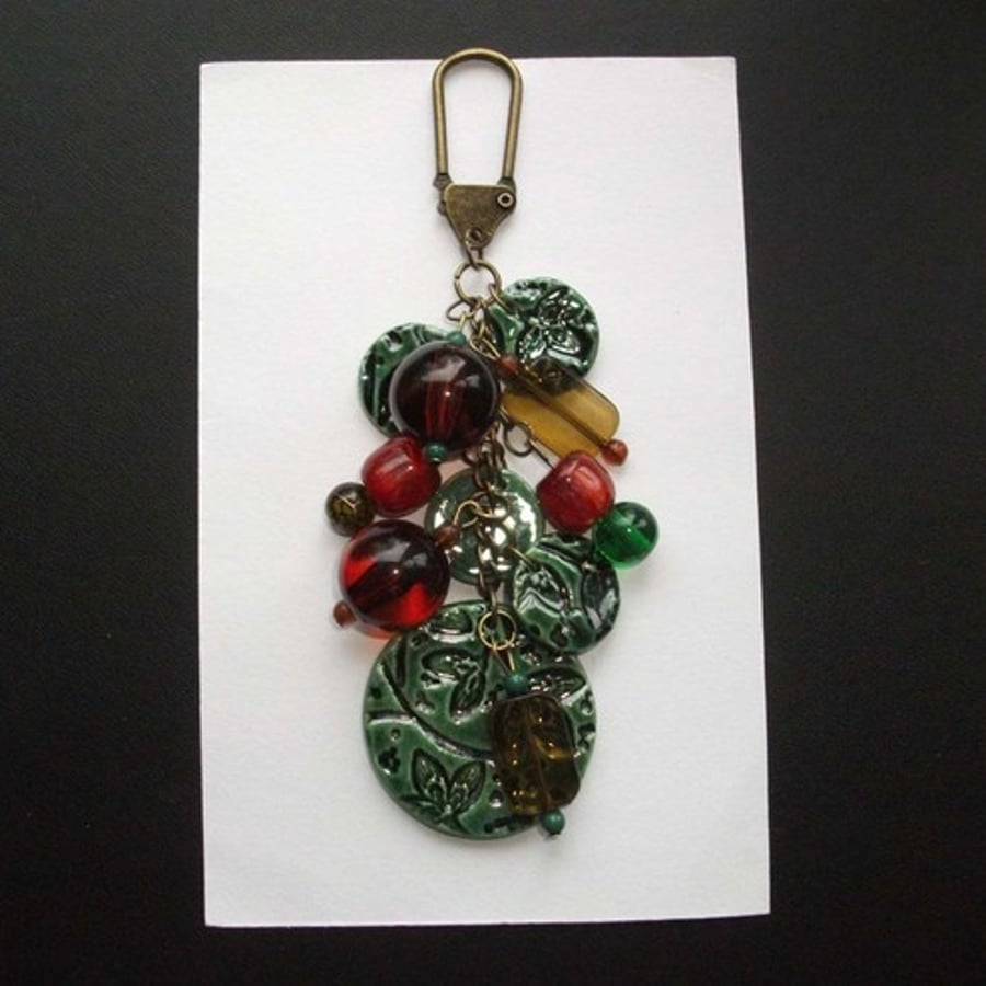 large green ceramic bag charm