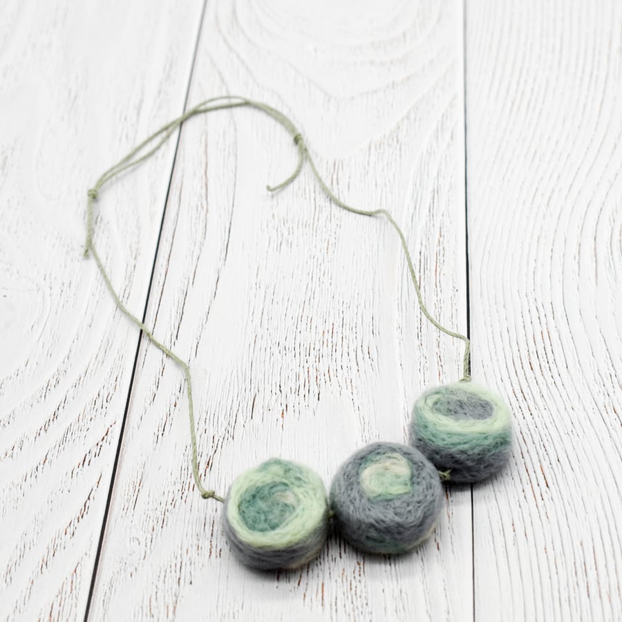 Felted bead necklace in green, cream and grey wool