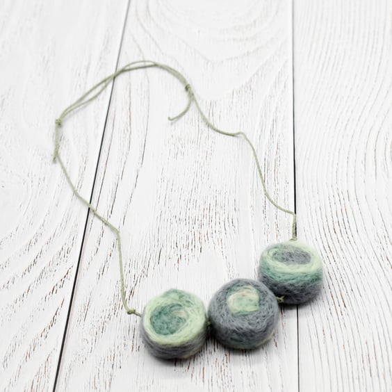 Felted bead necklace in green, cream and grey wool