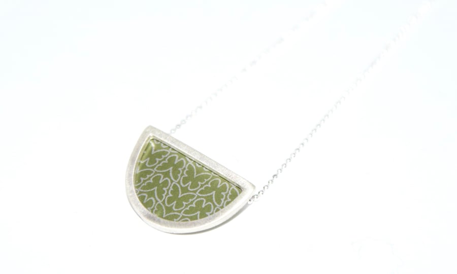 Silver and olive semi circle necklace - butterfly pattern