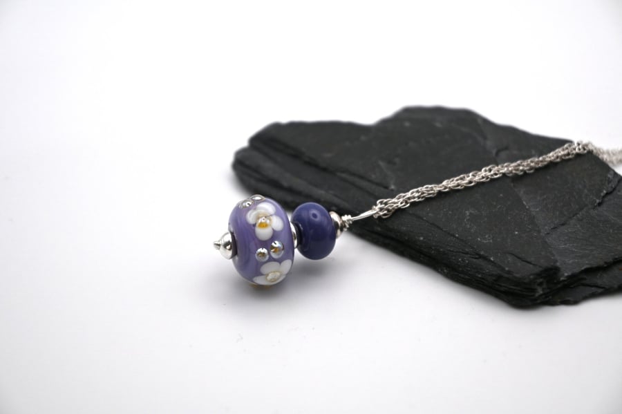 purple lampwork glass flower pendant necklace