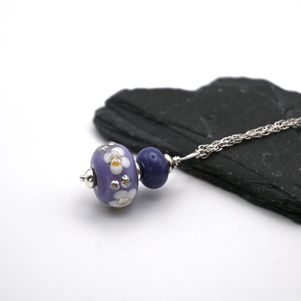 purple lampwork glass flower pendant necklace