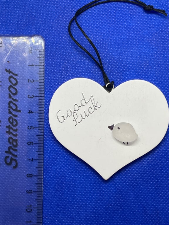 White wooden heart good luck gift.