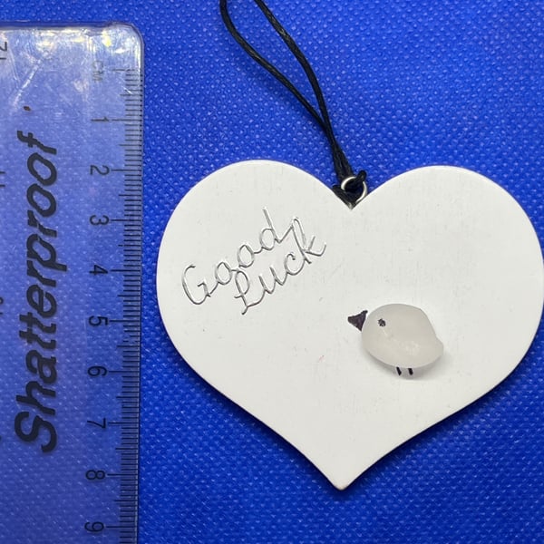 White wooden heart good luck gift.