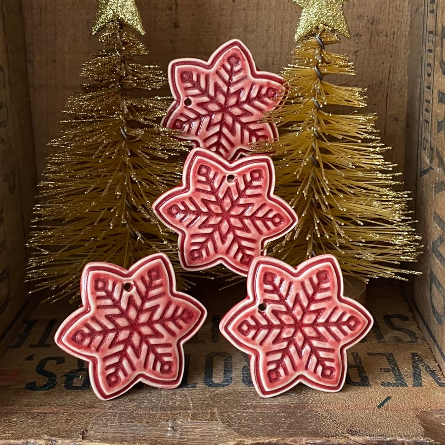 Special price Set of four red ceramic snowflakes