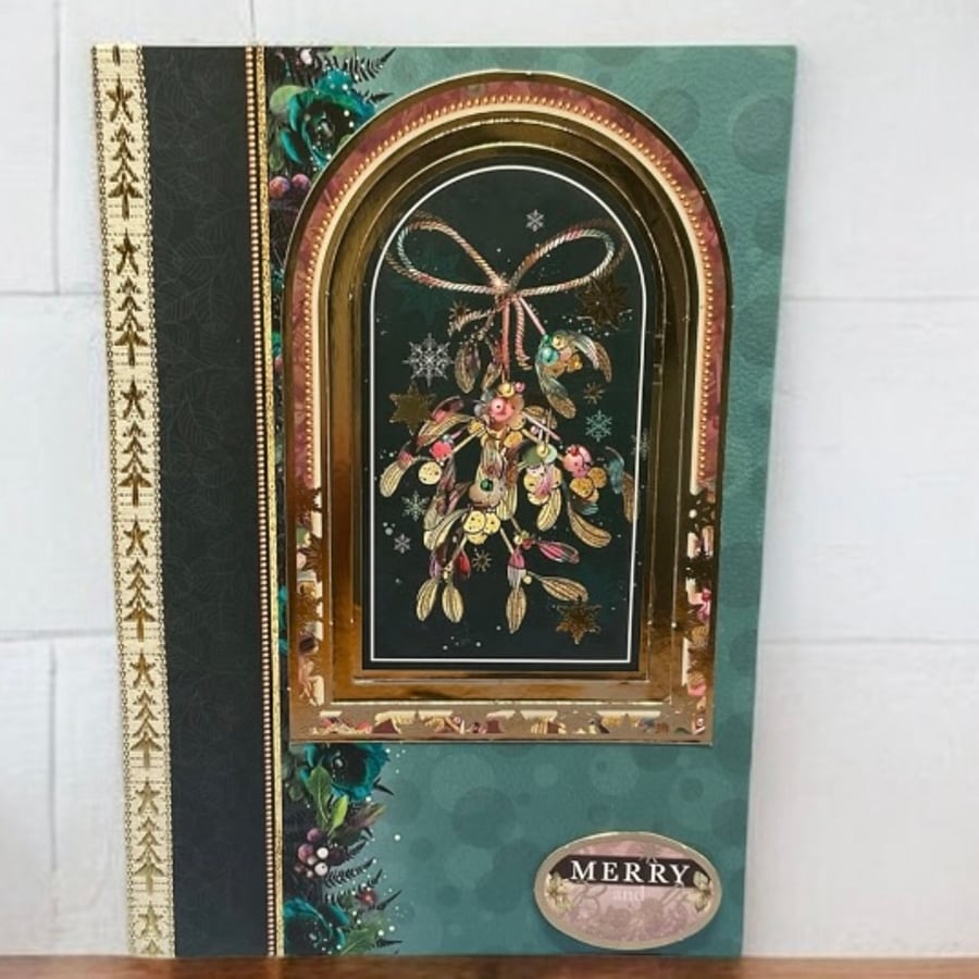 Luxury contemporary designed Christmas card with mistletoe.