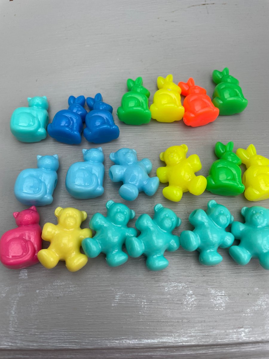 Set of 19 large fun shaped colourful beads. 