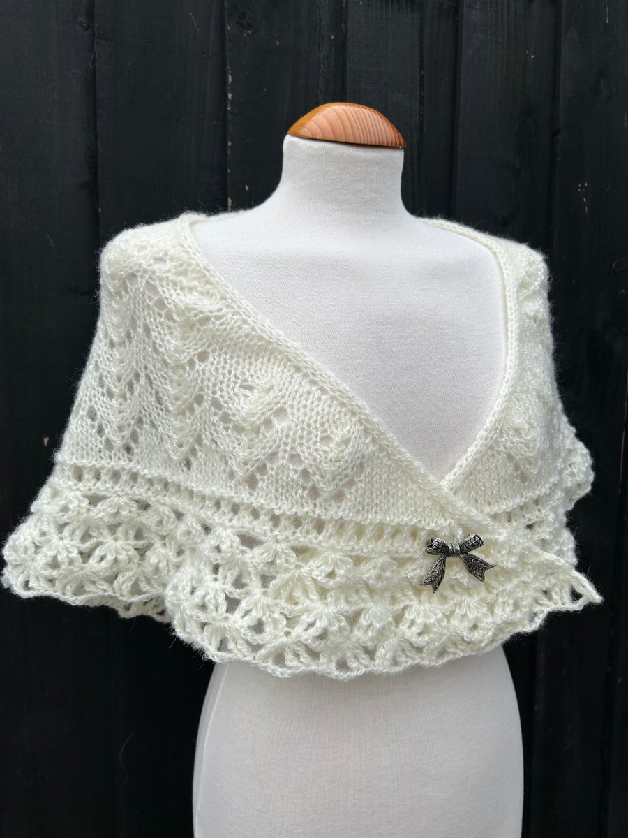 Hand knitted light cream shallow triangle lace shawl with crochet edging 