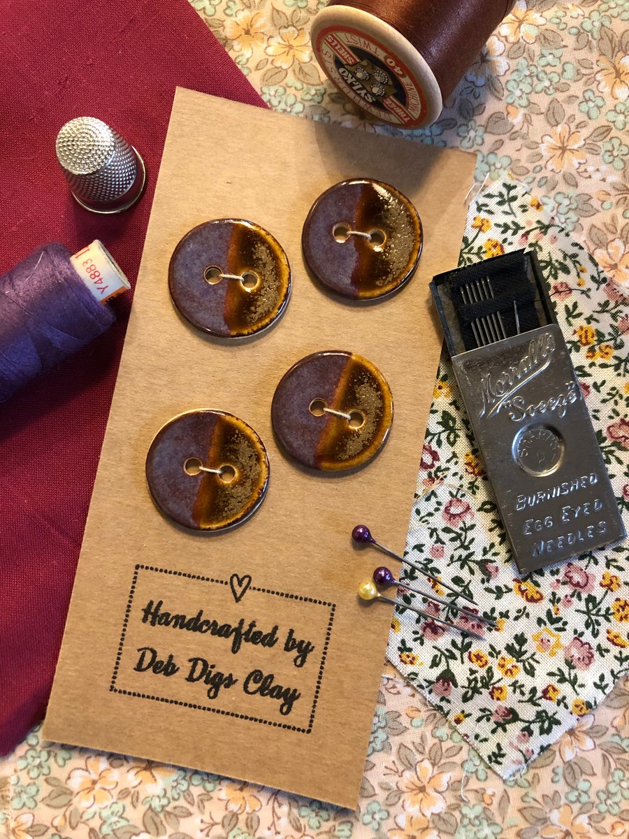 Set of 4 handcrafted ceramic buttons in smoky purple and amber
