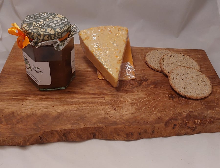 Handcrafted waney edge tiger oak wooden chopping board cheese board