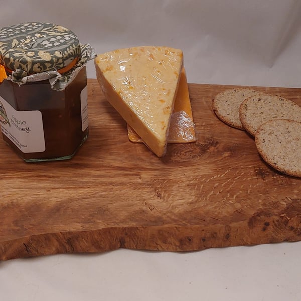 Handcrafted waney edge tiger oak wooden chopping board cheese board