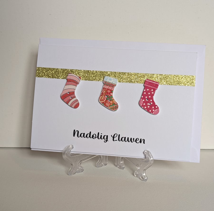 Nadolig Llawen Welsh Christmas card with stocking buttons