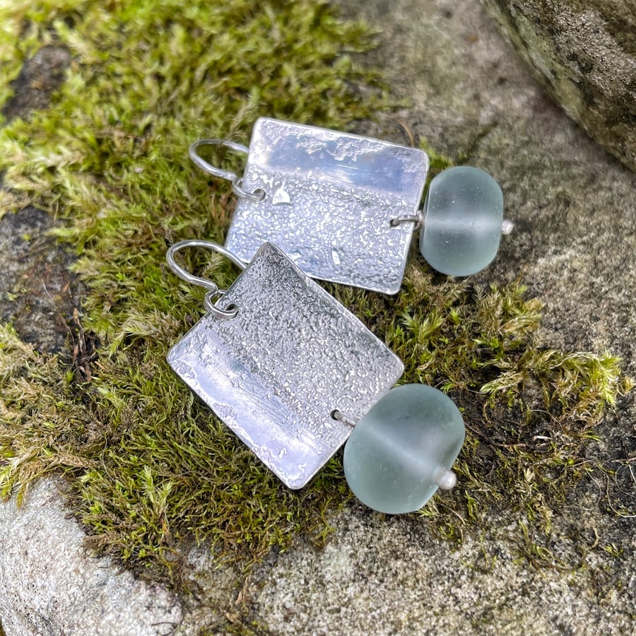 Textured silver and large frosted aqua glass bead earrings