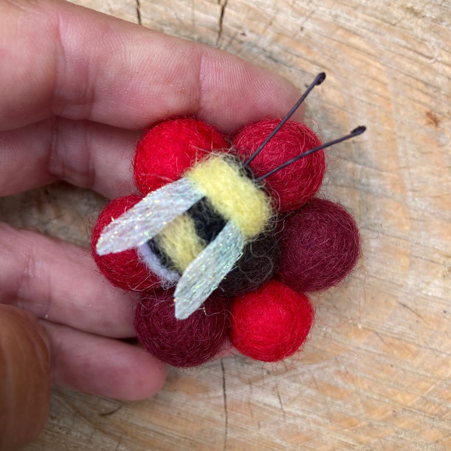 Fridge magnet, needle felted bee on felt ball flower (red)